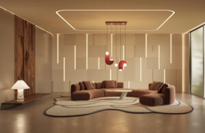 Salón con revestimiento acústico modular, sofá curvo marrón y luminarias colgantes